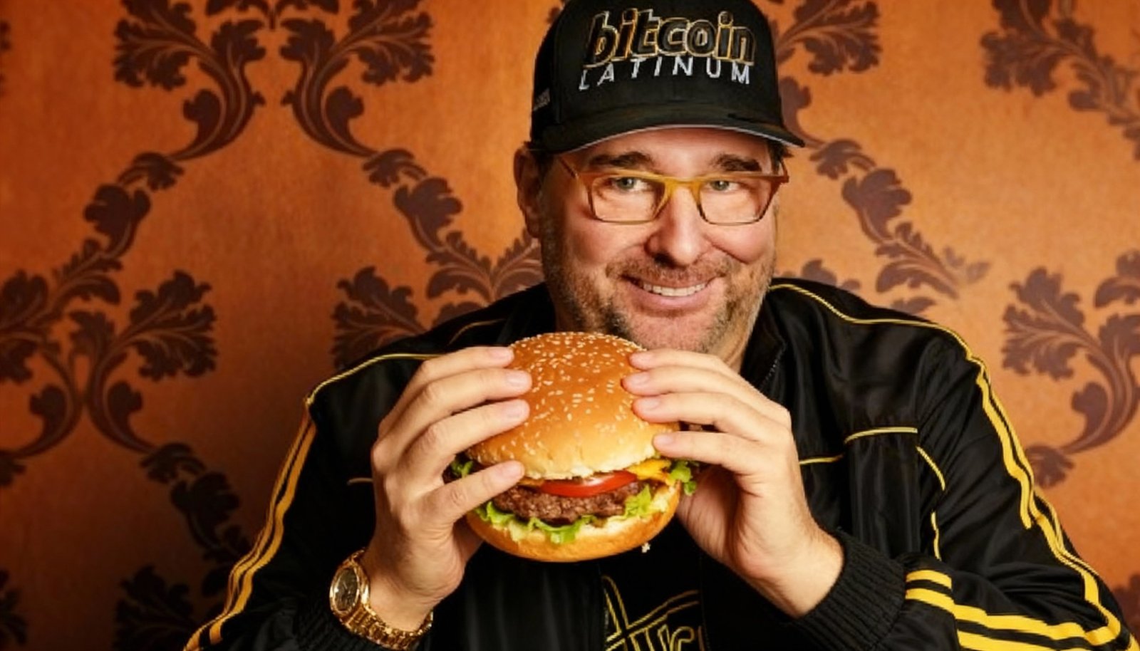Phil Hellmuth eating a burger
